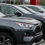 Top rated 2025 SUVs under 35000 in the US including Toyota RAV4 Honda CR V Hyundai Tucson Mazda CX 50 and Kia Sportage parked at a dealership